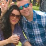 Brendan and his wife outdoors in summer